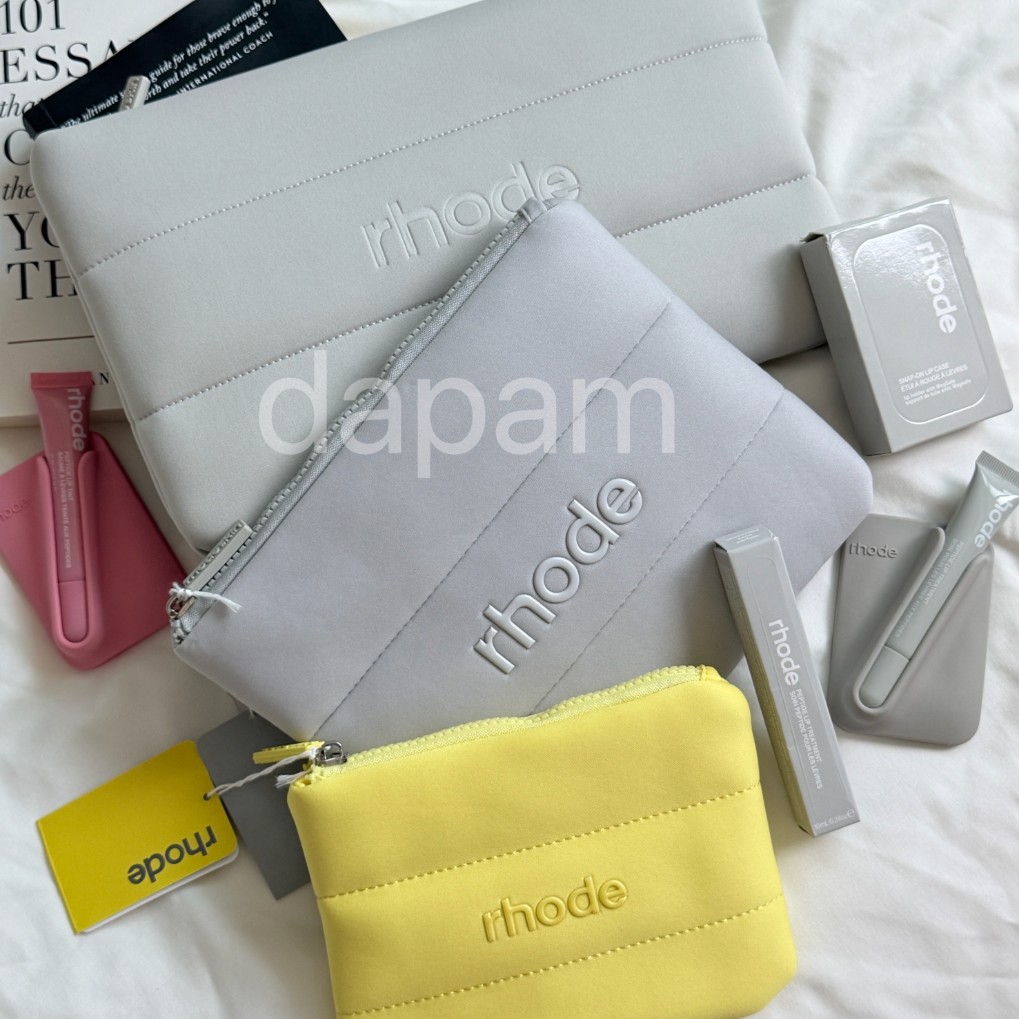 rhode 로드 스킨 패딩 지퍼 파우치 